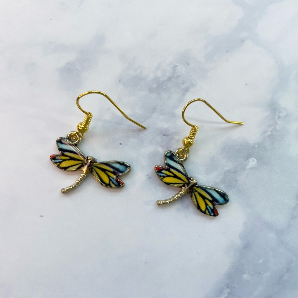 Gold dragonfly charm earrings. - Picture 2 of 3